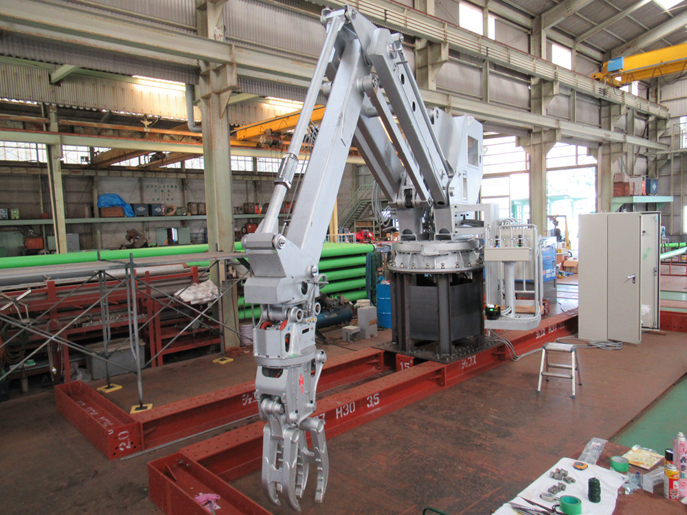 遠隔操作重量物ハンドリング装置